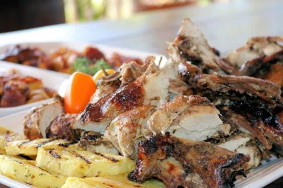 Feel the warmth of a jamaican home cooking class, taste real jerk chicken, and share lunch on a sea-view veranda. includes drinks, recipes, and local stories.