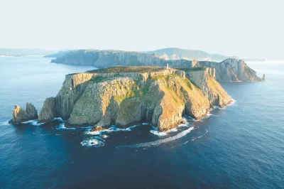 Feel the wild spray of the tasman peninsula on a 3-hour cruise from port arthur. see towering sea cliffs, seals, and remote caves with a local guide. includes jackets.
