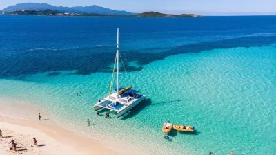 Set sail from fajardo to icacos island on a catamaran, swim in clear caribbean waters, snorkel vibrant reefs, and enjoy a picnic lunch—includes drinks & gear.