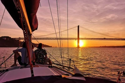 Feel lisbon’s golden hour from a sailboat on the tagus, with open bar, live commentary, and city views like belém tower & christ the king. includes drinks & local guide.