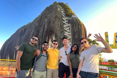 Wake up early in medellín for a guatapé day trip—climb peñol rock, enjoy a boat ride, traditional meals, and time with llamas. includes pickup & local guide.