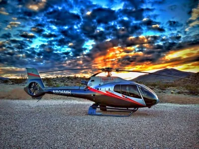 Viva a emoção de um passeio de helicóptero pelo grand canyon saindo de las vegas, com parada em um mirante exclusivo para brindar com champagne e ver o strip se iluminar ao pôr do sol. inclui tras