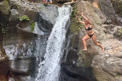 Let the sounds of tamanique’s waterfalls surprise you on a day trip from el tunco. swim, jump, and hike with a local guide—includes pickup and all fees.