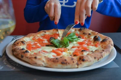 Start your rome pizza making class steps from the vatican, with a local chef, hands-on dough work, and a classic italian aperitivo included.