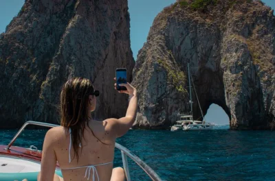 Step onto a small-group boat from positano to capri, swim at secret coves, enjoy a caprese sandwich lunch, and explore capri’s piazzetta with round-trip transfers.