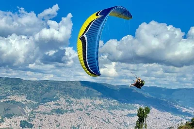 Feel medellín from above on a tandem paragliding flight with expert pilots, safe equipment, and flexible flight styles. includes ramp access, photos, and video transfer.
