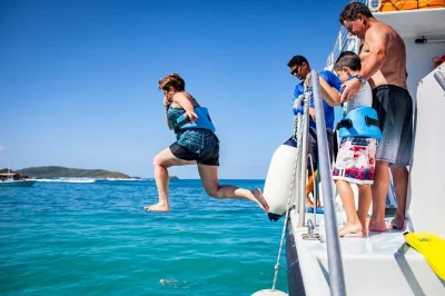 Feel the rush of a catamaran ride from fajardo to culebra’s beaches, snorkel colorful reefs, and relax with a deli lunch—includes gear and drinks onboard.