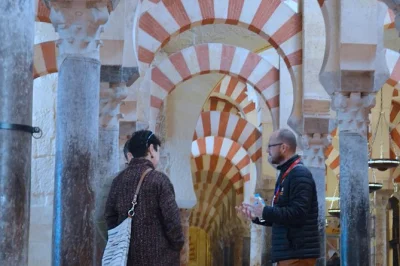 Step inside córdoba’s mosque-cathedral on a guided tour with entry included, hear stories from a local expert, and see the arches & mihrab up close.