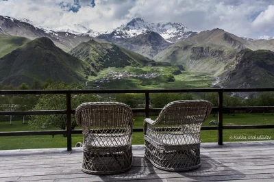 Feel the wild mountains of kazbegi, explore ananuri fortress, taste georgian wine, and ride up to gergeti monastery on this day trip from tbilisi with local lunch included.