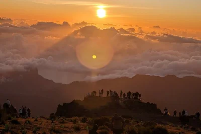 Wake up above the clouds at pico do arieiro, watch sunrise, enjoy a homemade breakfast, and stroll paradise valley. includes hotel pickup from funchal.