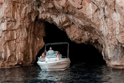 Feel the sea breeze on a private kotor bay speedboat tour to the blue cave and our lady of the rocks, with swimming, local stories, and museum visit included.