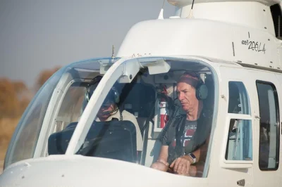 Feel the spray of victoria falls from above, spot elephants along the zambezi, and enjoy hotel pickup for a seamless helicopter flight adventure.