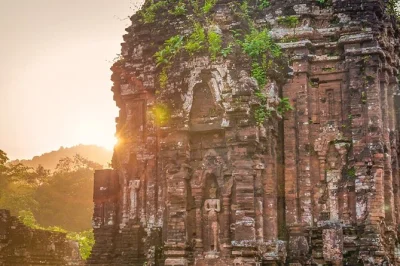 Feel the ancient spirit at my son sanctuary, watch champa dance, and drift along thu bon river at sunset—includes hotel pickup, local guide, and banh my snack.