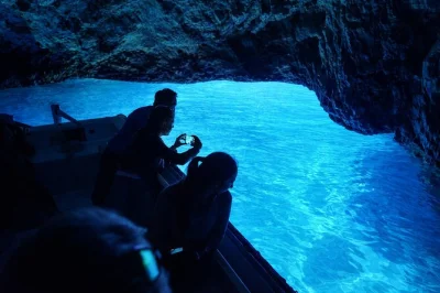 Swim in montenegro’s blue cave, see our lady of the rocks, and explore wwii tunnels on a private boat tour with guide, snorkeling gear, and all fees included.