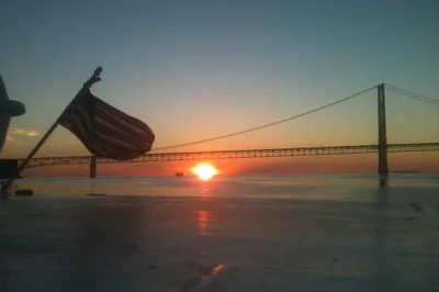 Watch the sun dip behind the mackinac bridge on a lake michigan sunset cruise from mackinaw city. includes local guide, live commentary, and flexible departures.