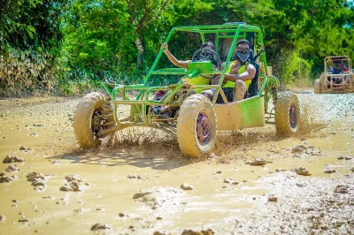 Feel the rush of driving buggies through punta cana’s countryside, swim in a crystal water cave, relax at macao beach and taste fresh dominican coffee—includes pickup.