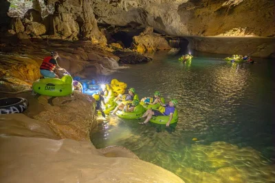 Float through ancient caves on a belize cave tubing day trip, hike the jungle, and enjoy a picnic lunch. includes all equipment, entry fees, and local guide.