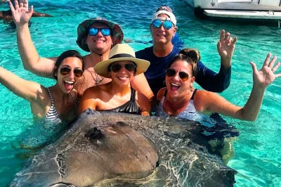 Feel the sandbar at stingray city, snorkel coral reefs, and meet starfish on a private grand cayman boat charter—includes gear, drinks, and local crew guidance.