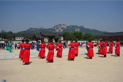 Start your seoul day trip with palace guards, wander bukchon hanok village, and share korean lunch in insadong. includes hotel pickup and english guide.