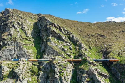 Feel the rhythm of the taieri gorge railway from dunedin, crossing wild viaducts and tunnels with live commentary, local stories, and a scenic café stop.