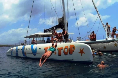 Feel the ocean breeze on a sosua beach catamaran, snorkel two reefs, enjoy lunch and open bar with hotel pickup—real moments, not just a tour.