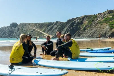 Feel the atlantic spray with a beginner surf lesson on portugal’s wild west coast. includes wetsuit, board, and transfers to arrifana or amoreira beach.