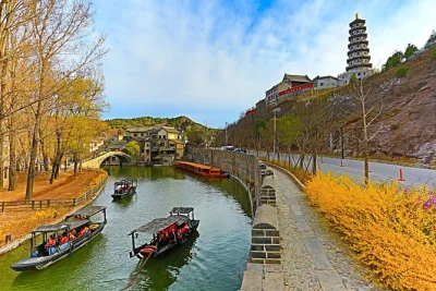 Stay overnight at gubei water town, explore simatai great wall with cable car, private guide, meals, and airport transfers included. book your beijing getaway.