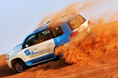 Feel the abu dhabi desert come alive with dune bashing, camel rides, sandboarding, and a sunset bbq dinner. includes hotel pickup and local guide.