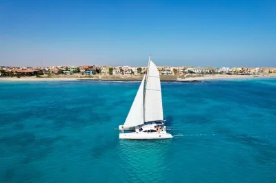Feel the atlantic breeze off sal island on a half-day cape verde catamaran cruise, with swimming, drinks, snacks, and a friendly local crew. includes snorkel gear.
