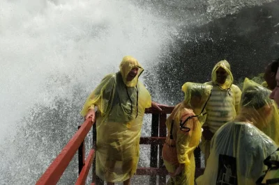 Feel the spray on a maid of the mist boat ride, see niagara falls from skylon tower, and cross borders with a local guide—hotel pickup and entry fees included.