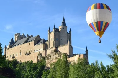 Feel the sunrise over segovia or toledo from a hot air balloon, with a local guide, cava toast, spanish brunch, and hotel pickup included for a seamless day.