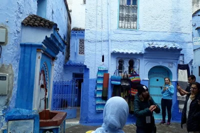 Start your day from fes and wander chefchaouen’s blue medina, pause at ras el-maa waterfall, enjoy local stories with a guide, and relax with hotel pickup included.