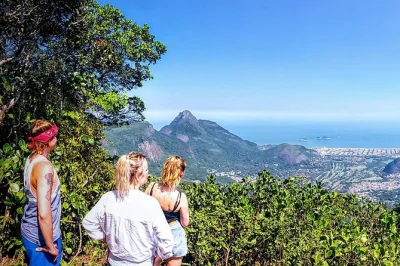 Feel the wild side of rio on a hard hike through tijuca forest, climb taquara hill, visit caves and ruins, and cool off in a waterfall. includes pickup.