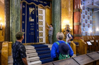 Step inside budapest’s jewish quarter with a local guide, see dohány street synagogue, taste kosher cake, and learn real stories—includes synagogue entry.