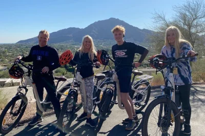Feel the rush of e-biking from old town scottsdale to paradise valley, hike camelback’s cholla trail, and ride safe scenic paths—includes guide, water, helmet.