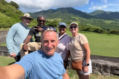 Feel the real st kitts with a small group tour—walk brimstone hill, sample local rum, see black sand beaches & unwind at frigate bay. includes snacks & guide.