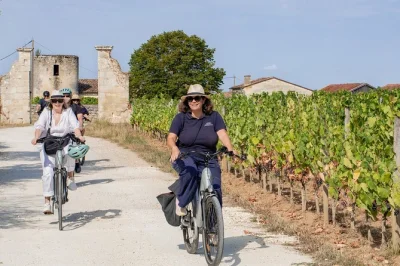 Feel the breeze cycling through saint-emilion vineyards, taste bordeaux wines at family-run chateaux, and enjoy a vineyard lunch. includes pickup & local guide.