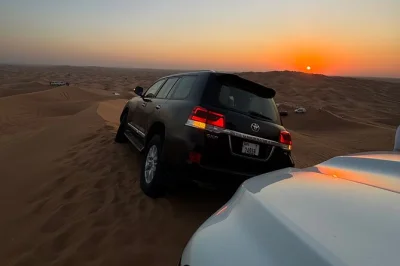 Feel the desert’s golden hour on a dubai red dune safari with sunset photo stops, camel ride, live shows & bbq dinner. includes hotel pickup & local guide.