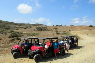 Feel the rush of aruba’s wild coast on a guided utv tour, cliff jump at a cave pool, explore bushiribana gold mill ruins, with pickup included for easy booking.