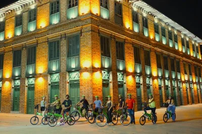 Feel medellín’s energy after dark on a night bike tour with city viewpoints, local snacks, and a guide who knows every shortcut. includes bikes, helmet, and street food stops.