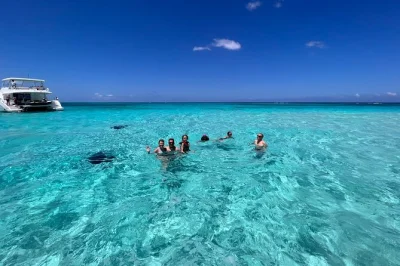 Swim with stingrays at stingray city, snorkel coral reefs, and unwind at rum point or kaibo beach. flexible grand cayman boat tour with local guides and easy pickup.