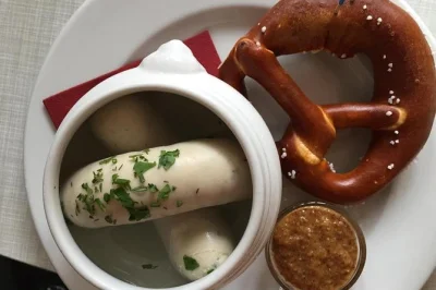 Sample munich’s viktualienmarkt with a small group, tasting weisswurst, fresh pretzels, bavarian beer and cakes—guided by a local foodie. lunch included.