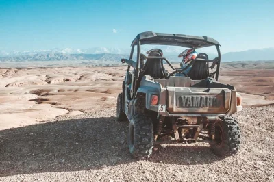 Feel the wind in agafay desert on a private buggy tour, taste tajine under a tent, and start from a real oasis. includes pickup, english guide, and lunch.