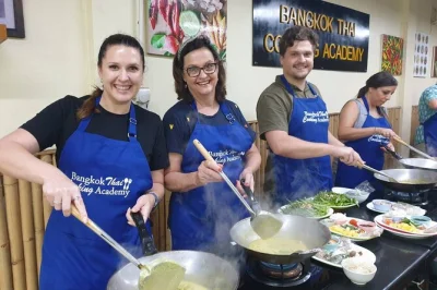 Let your taste buds lead in bangkok—pick five thai dishes to cook, visit a bustling sukhumvit market, and learn from a local chef. includes pickup & lunch.