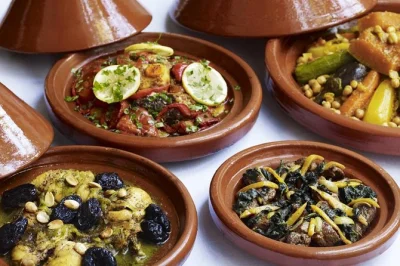Join a fes cooking class with a local chef, shop at the medina market, and cook moroccan dishes like tagine and couscous. hotel pickup included.
