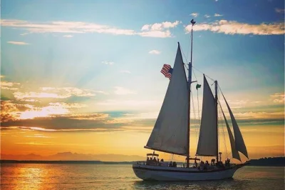 Feel the wind on a seattle sunset sail, help raise the sails, spot mt. rainier and the space needle, sip a drink as the city glows. includes restroom onboard.