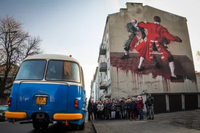 Step into warsaw’s praga district on a retro bus tour with live local guide, pre-war streets, murals, and a hot chocolate stop included. small group experience.