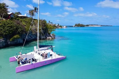 Feel the breeze on a bermuda catamaran, snorkel in hidden coves, sip fresh rum swizzles, and snack on warm cookies baked onboard. includes all gear & drinks.