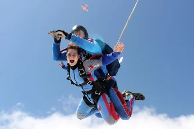 Feel the rush of tandem skydiving near prague with a local guide, roundtrip minivan transport, and a jump certificate—includes all gear and safety briefing.