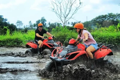 Feel the mud on bali’s best quad bike tracks, then snorkel at blue lagoon beach—includes hotel pickup, lunch, and a local guide for both adventures.